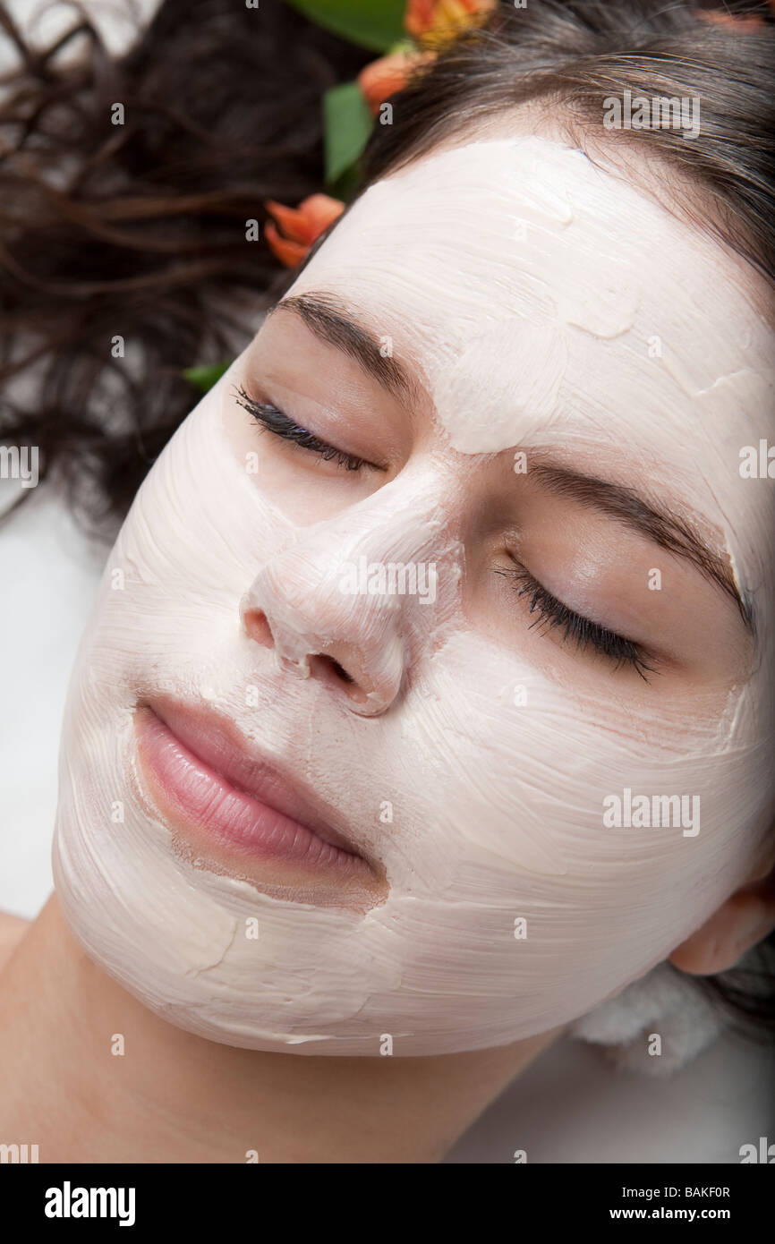 Young woman getting a facial treatment at a spa Stock Photo - Alamy