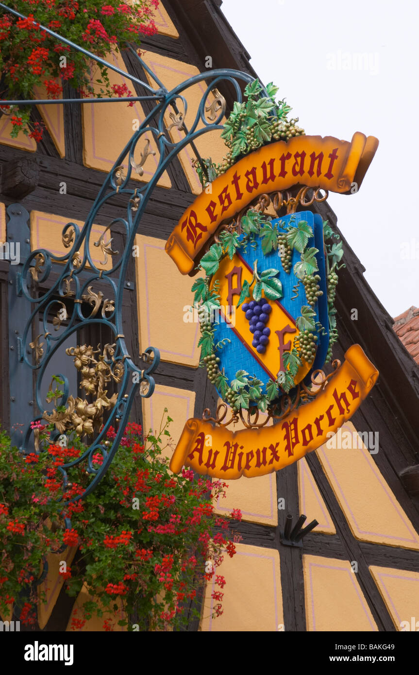 wrought iron sign restaurant au vieux porche dom paul zinck eguisheim alsace france Stock Photo