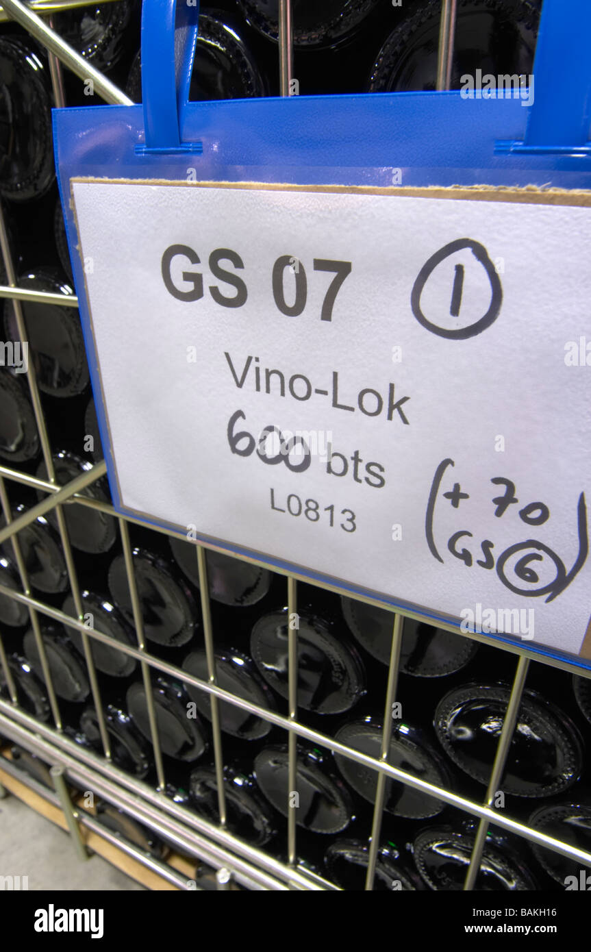 bottles stored in wire cages with vino-lok dom pfister dahlenheim alsace france Stock Photo
