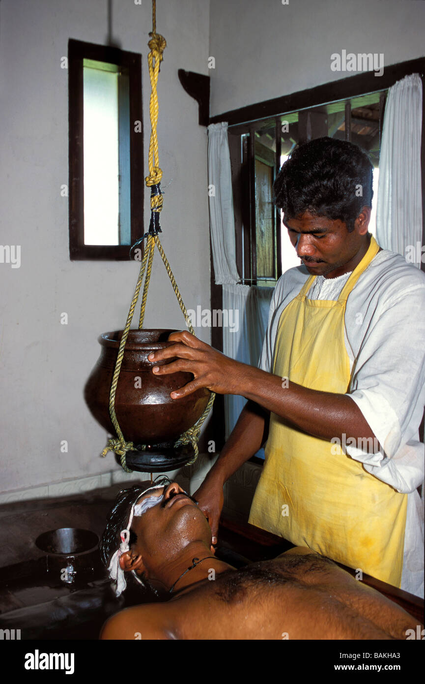 India, Kerala State, Kumarakom, shirodara ayurvedic massage Stock Photo
