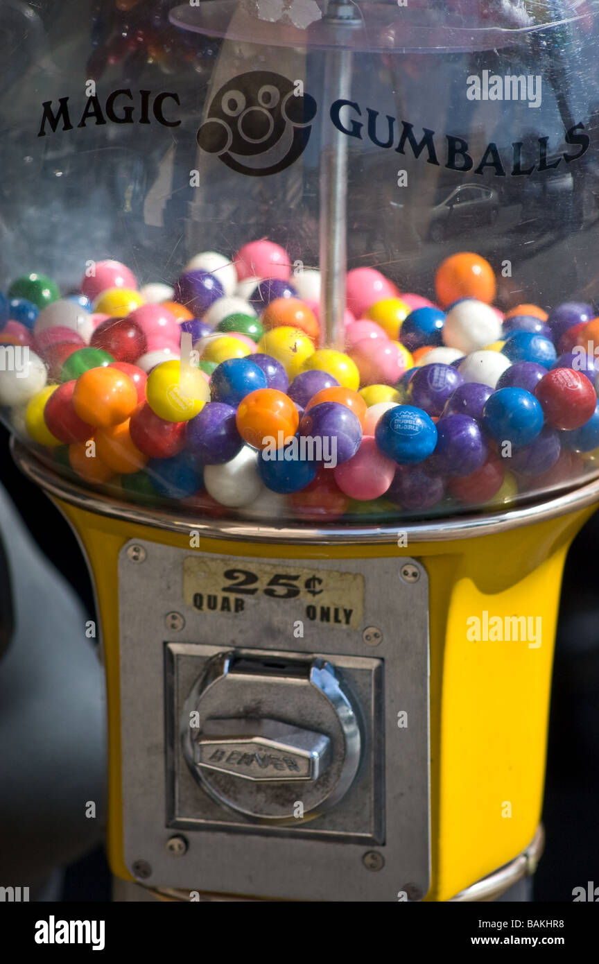 A gum ball candy machine outside of a shop on Main Street; Huntington Beach Stock Photo