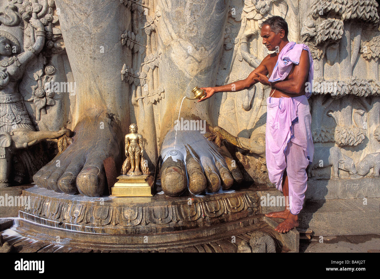 India, Karnataka State, Dharmastala, milk anointing of Bahubali statue