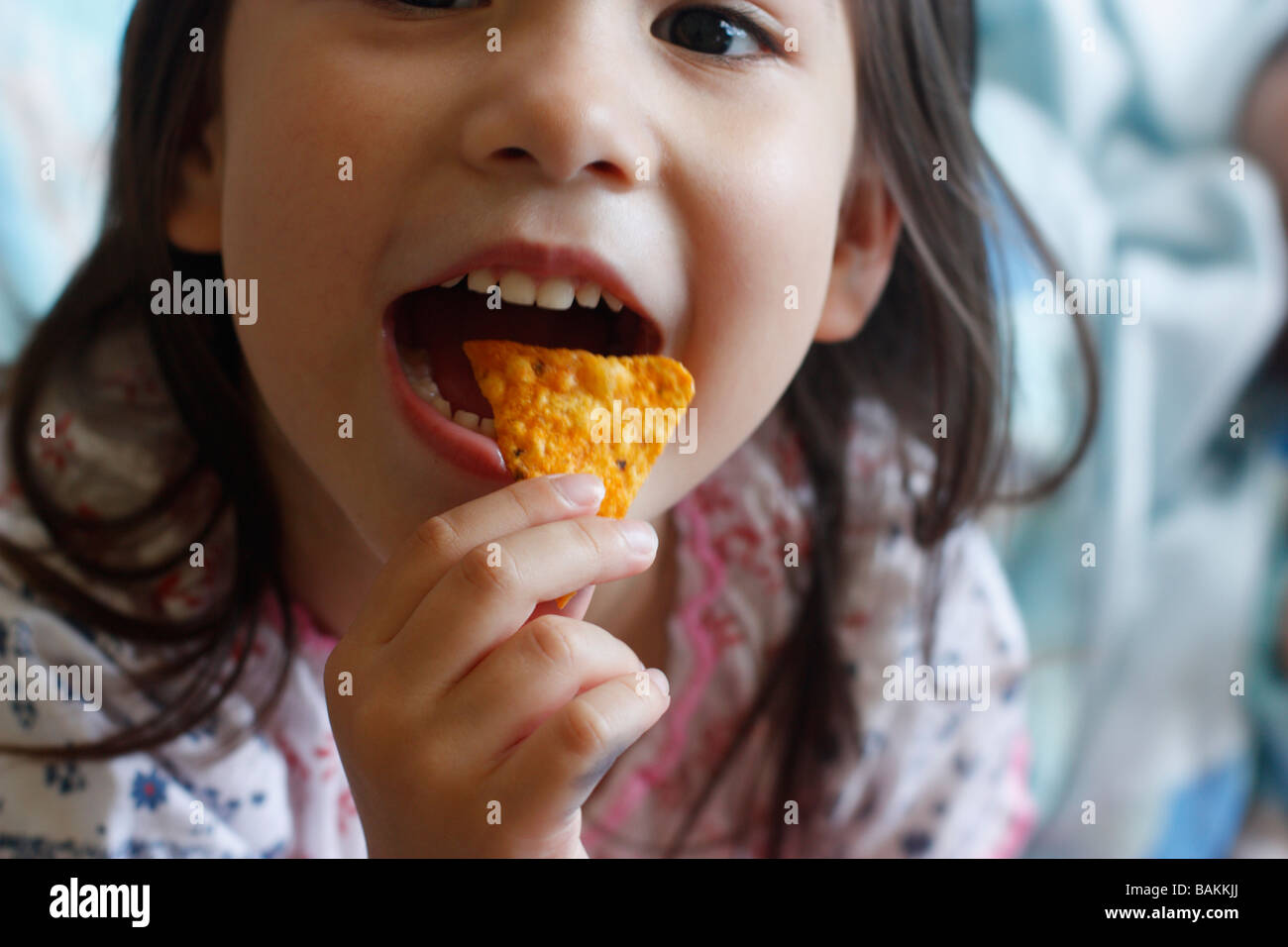 Child eating tortilla chip hires stock photography and images Alamy