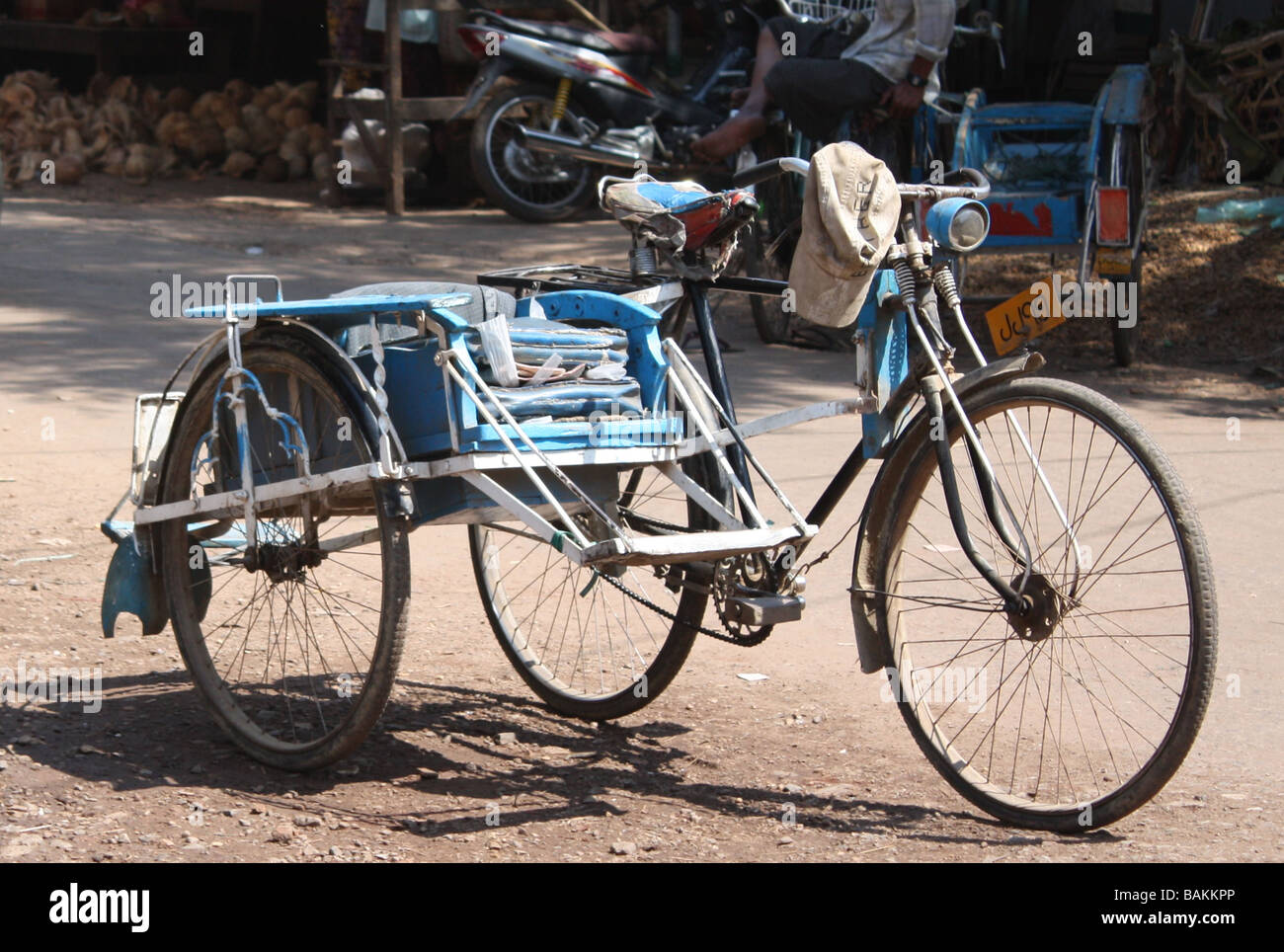 Bicycle rickshaw on the streets of Rangoon, Burma Stock Photo
