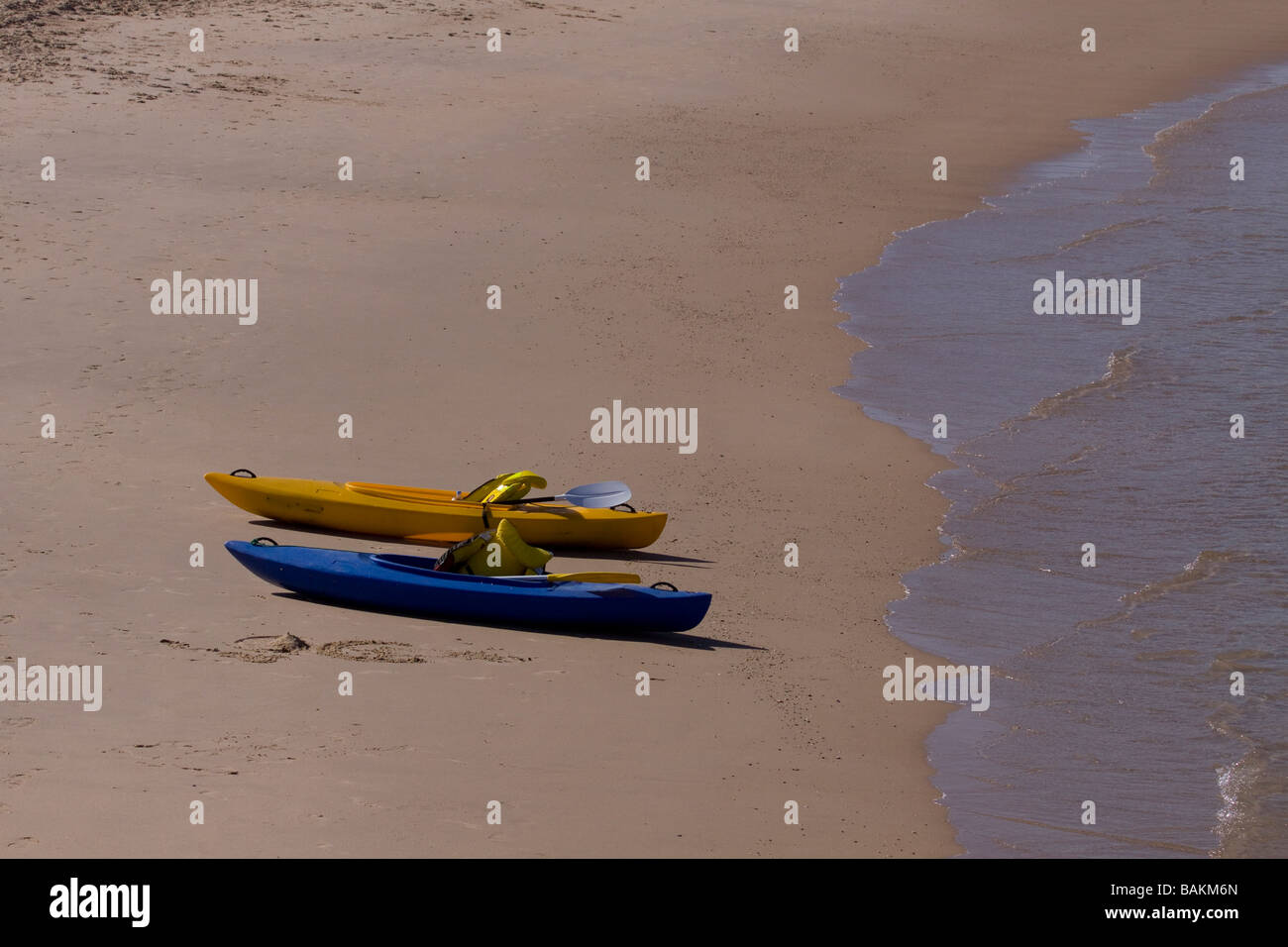 Two kayaks on the beach Stock Photo - Alamy