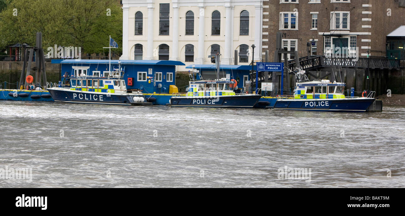 Thames River police boats on pier along the River Thames at Wapping London Stock Photo