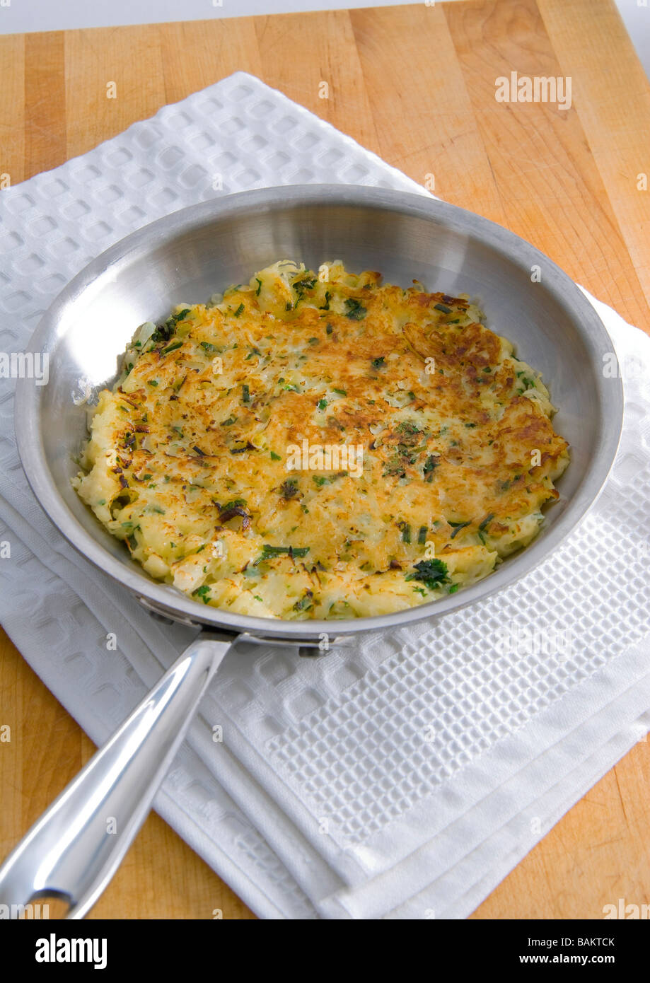 potato and herb galette Stock Photo