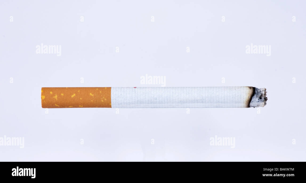 lite cigarette burning Stock Photo