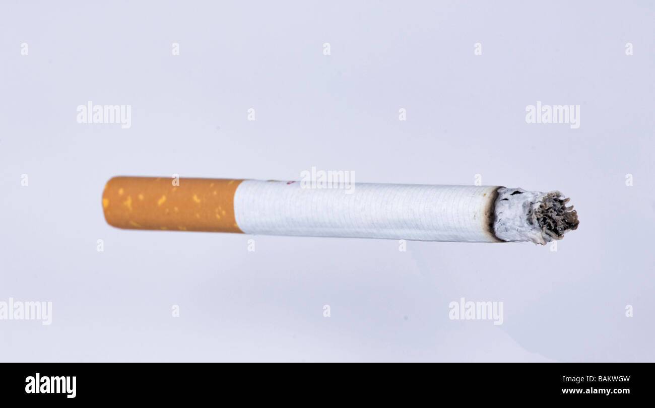 lite cigarette burning Stock Photo