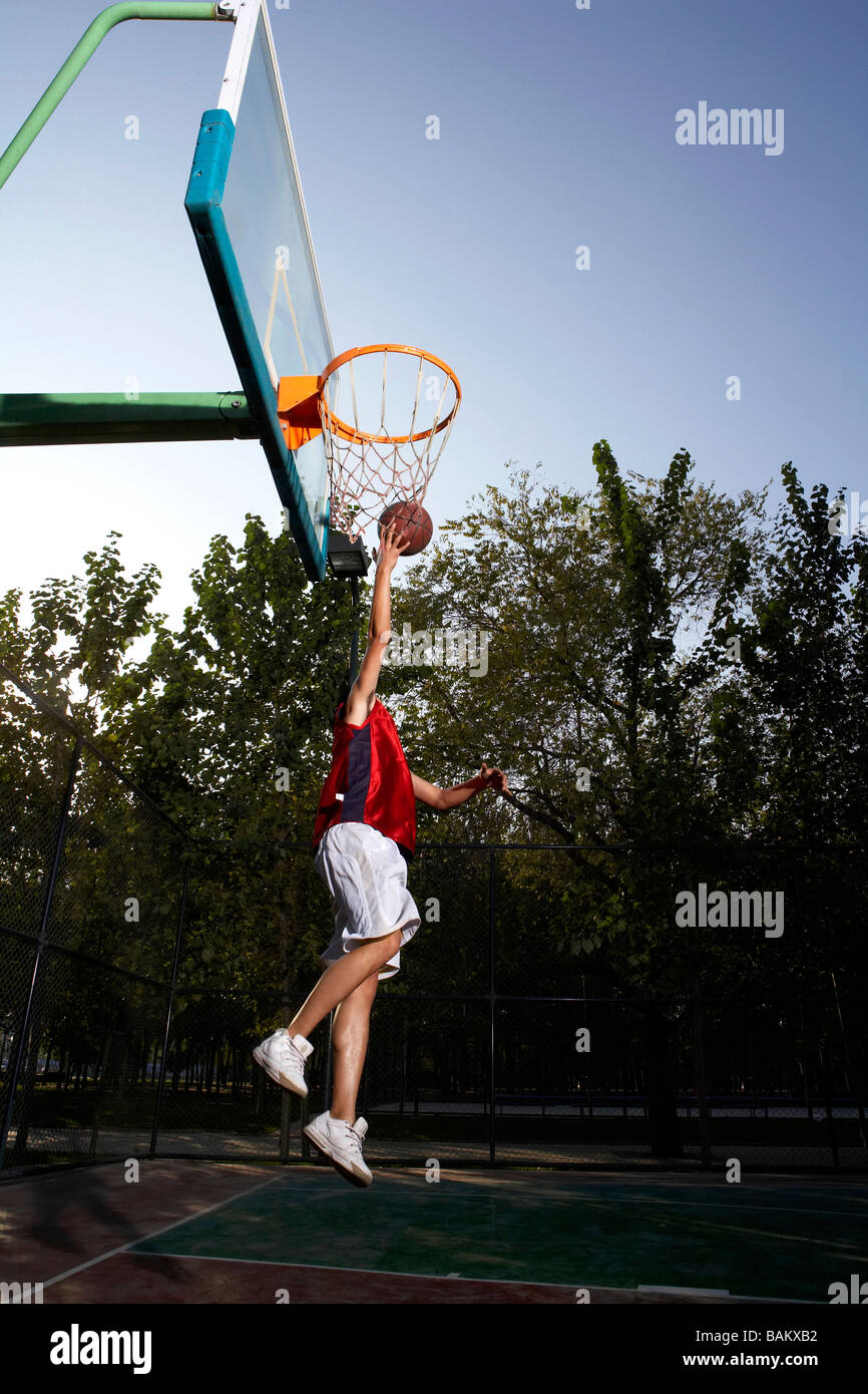 Basketball Player Shooting Hoops Stock Photo Alamy
