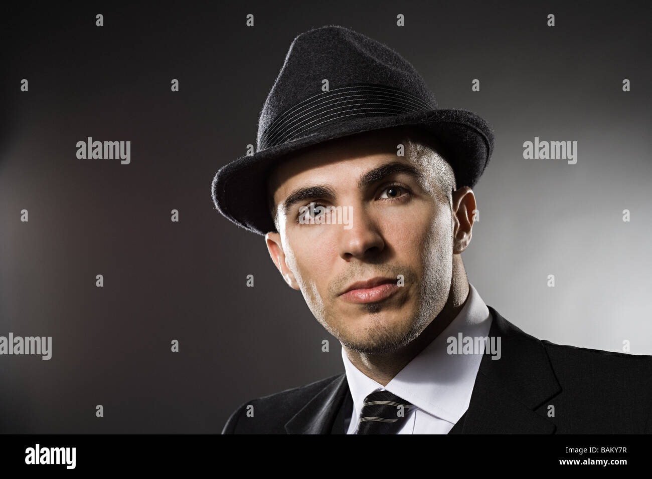 Portrait of a young man wearing a fedora Stock Photo