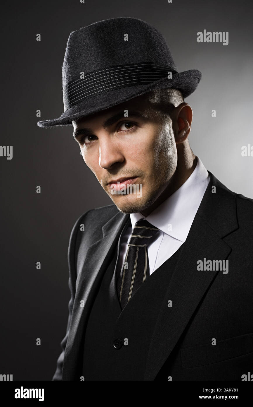 Portrait of a young man wearing a fedora Stock Photo