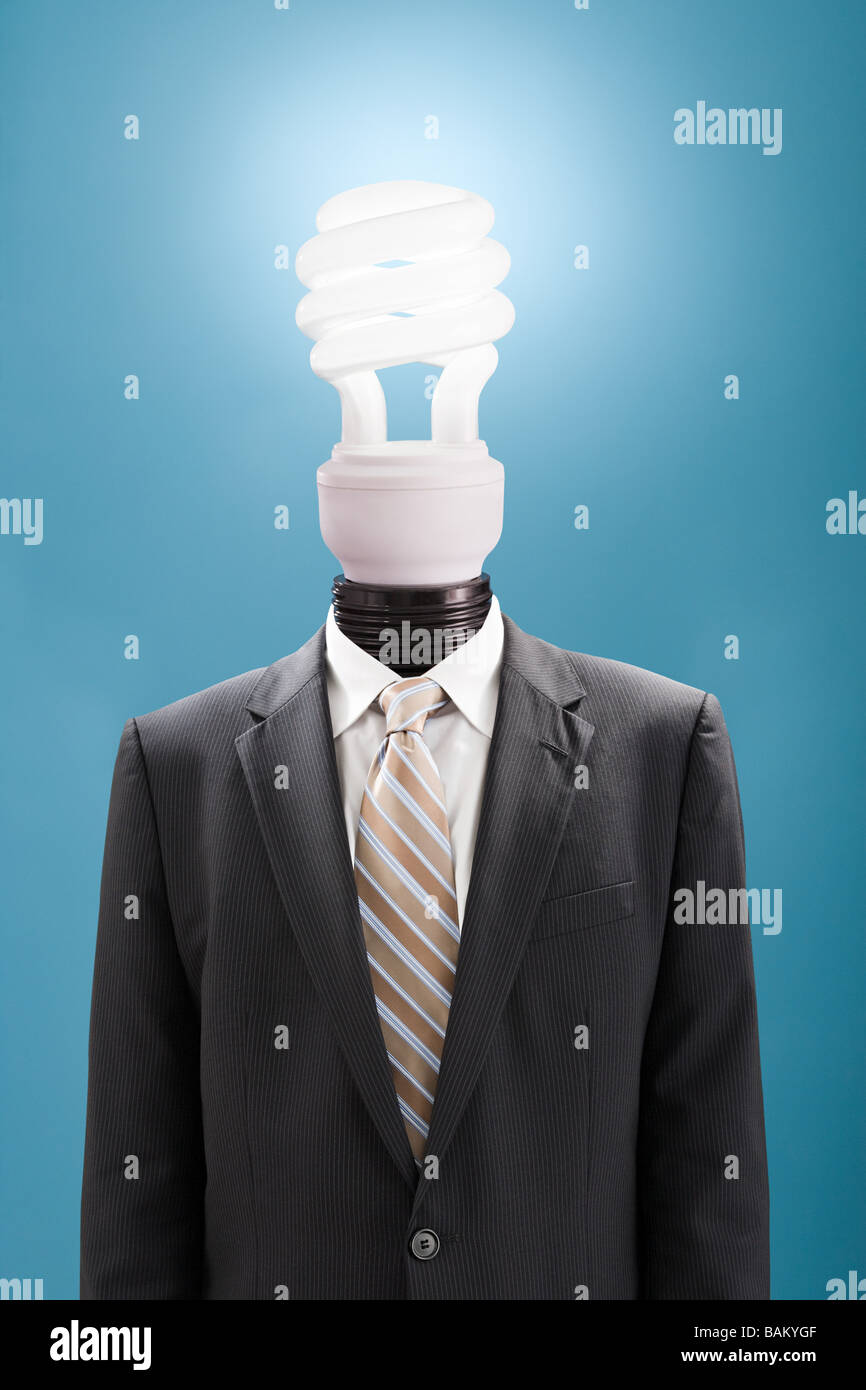 Businessman with energy saving lightbulb as head Stock Photo