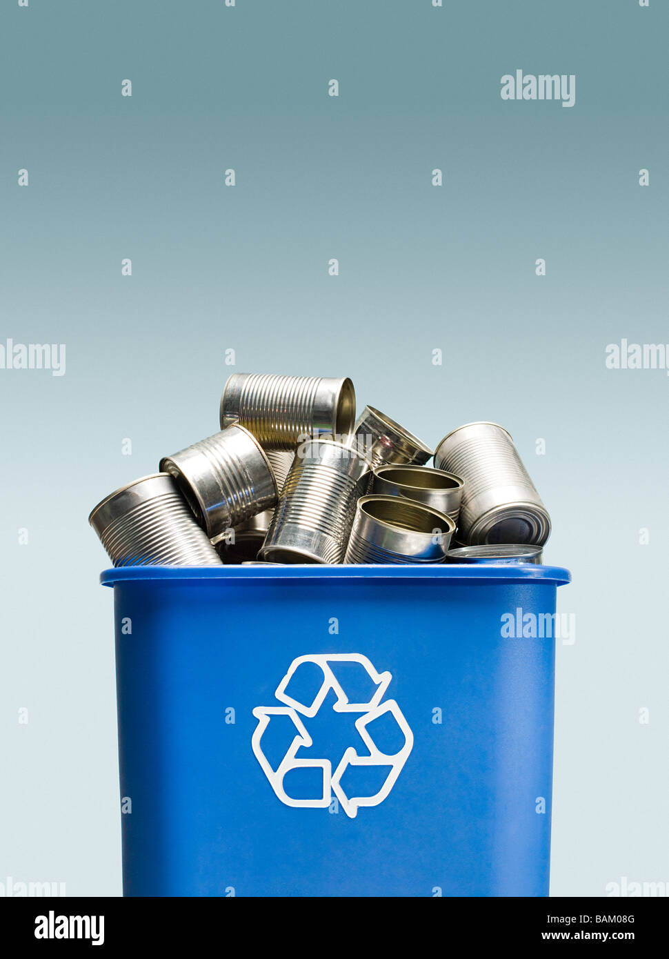 Tin cans in a recycling bin Stock Photo - Alamy