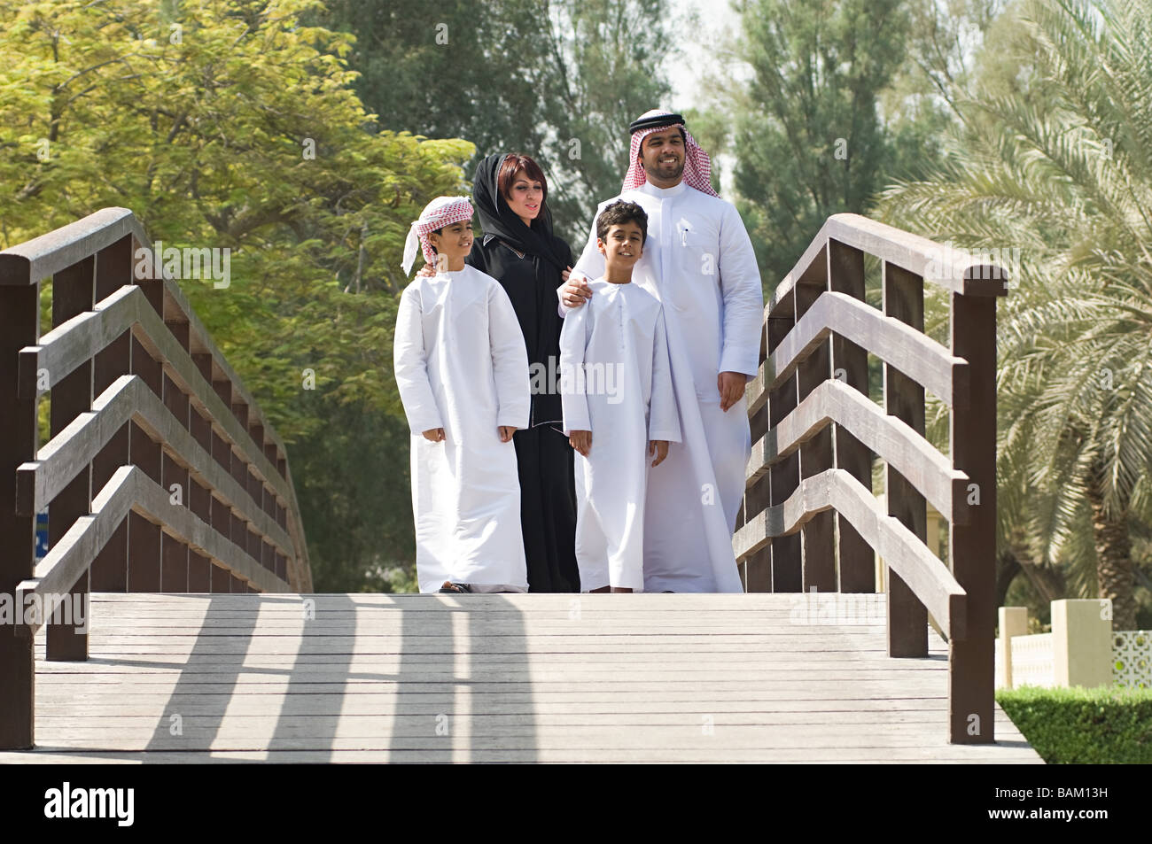 A family on a bridge Stock Photo