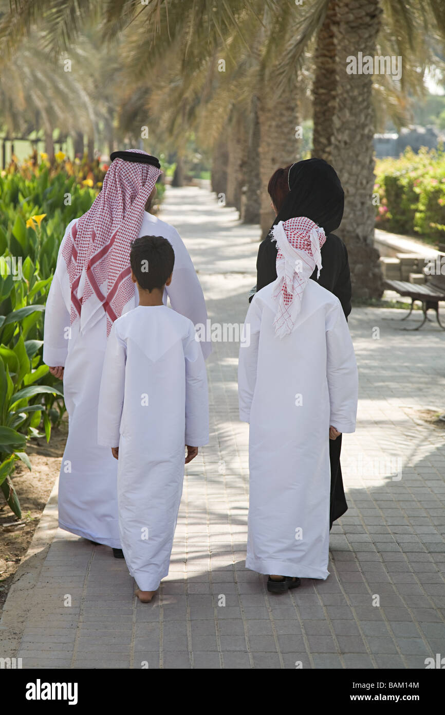 Rear view of a family walking Stock Photo