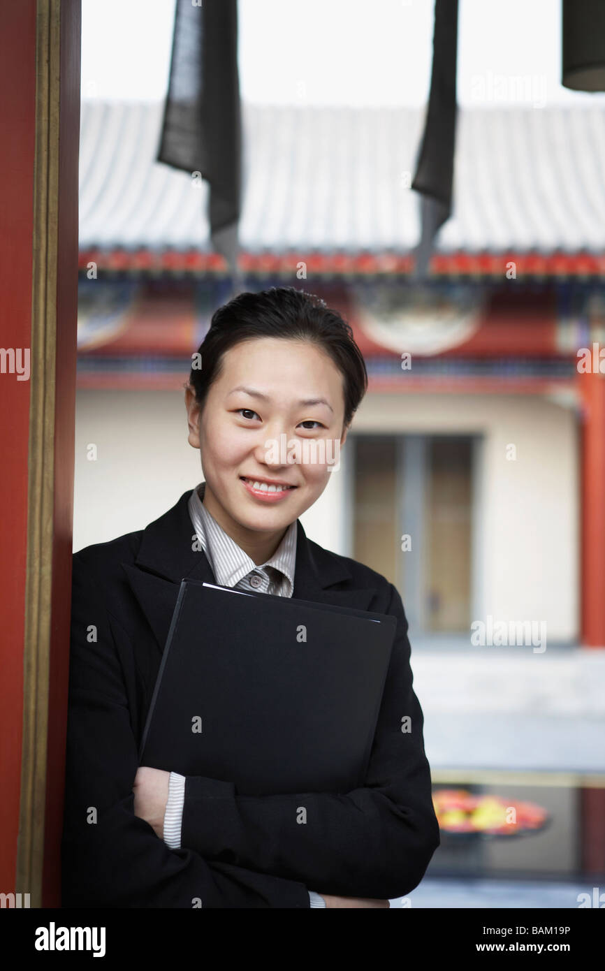 Smiling asian woman arms hi-res stock photography and images - Alamy