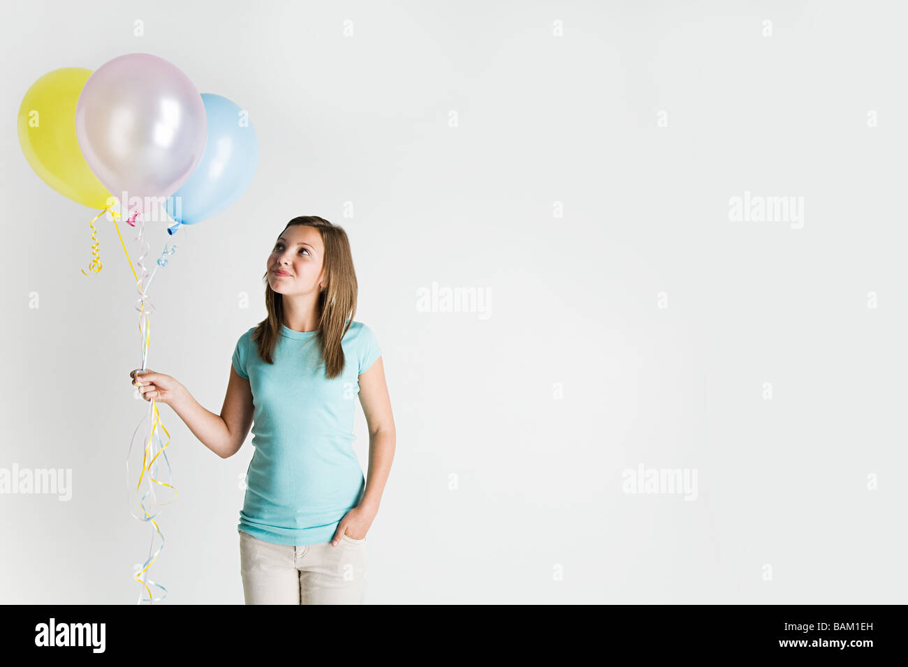 Girl with balloons Stock Photo Alamy