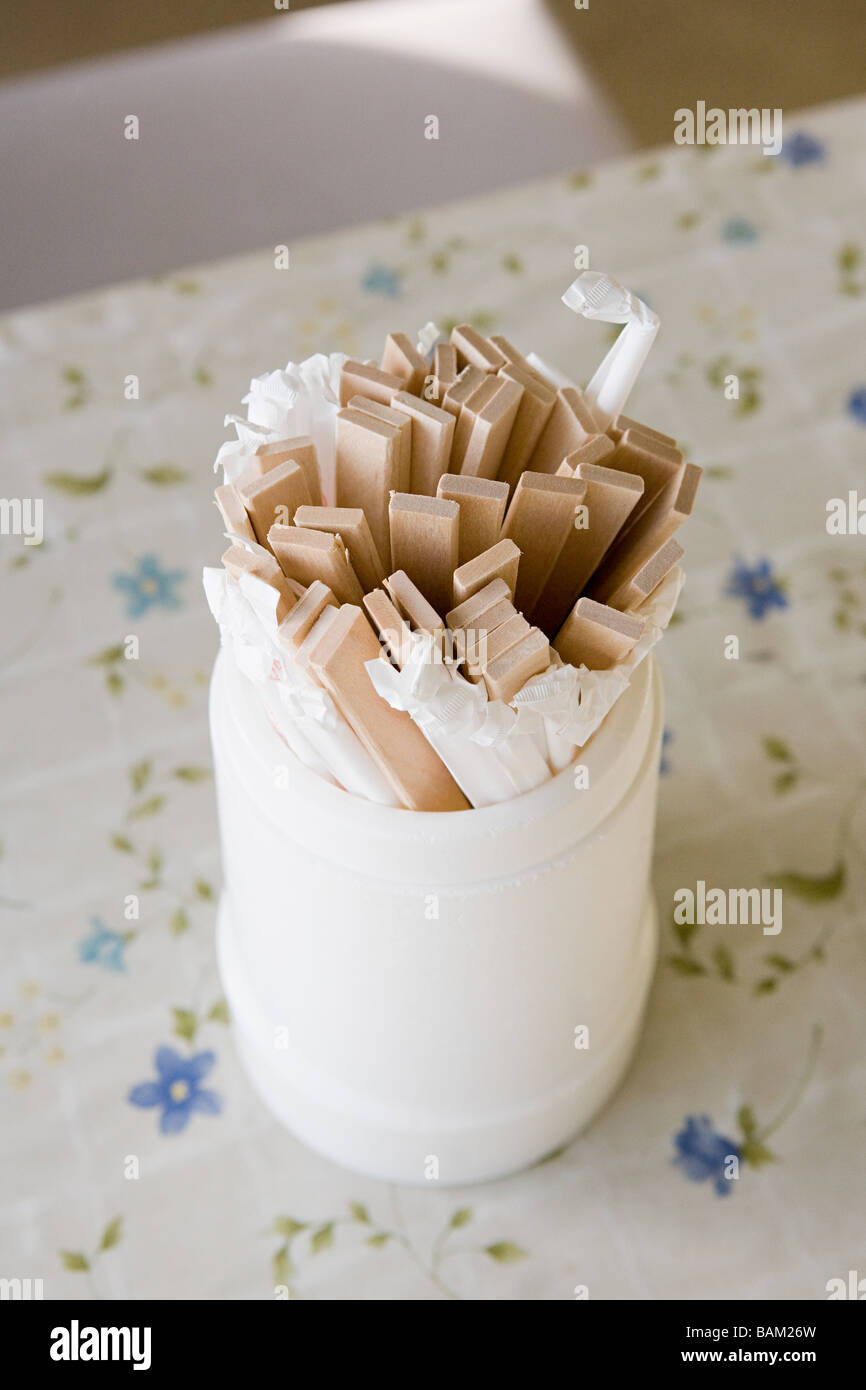 A container of wooden chopsticks Stock Photo Alamy