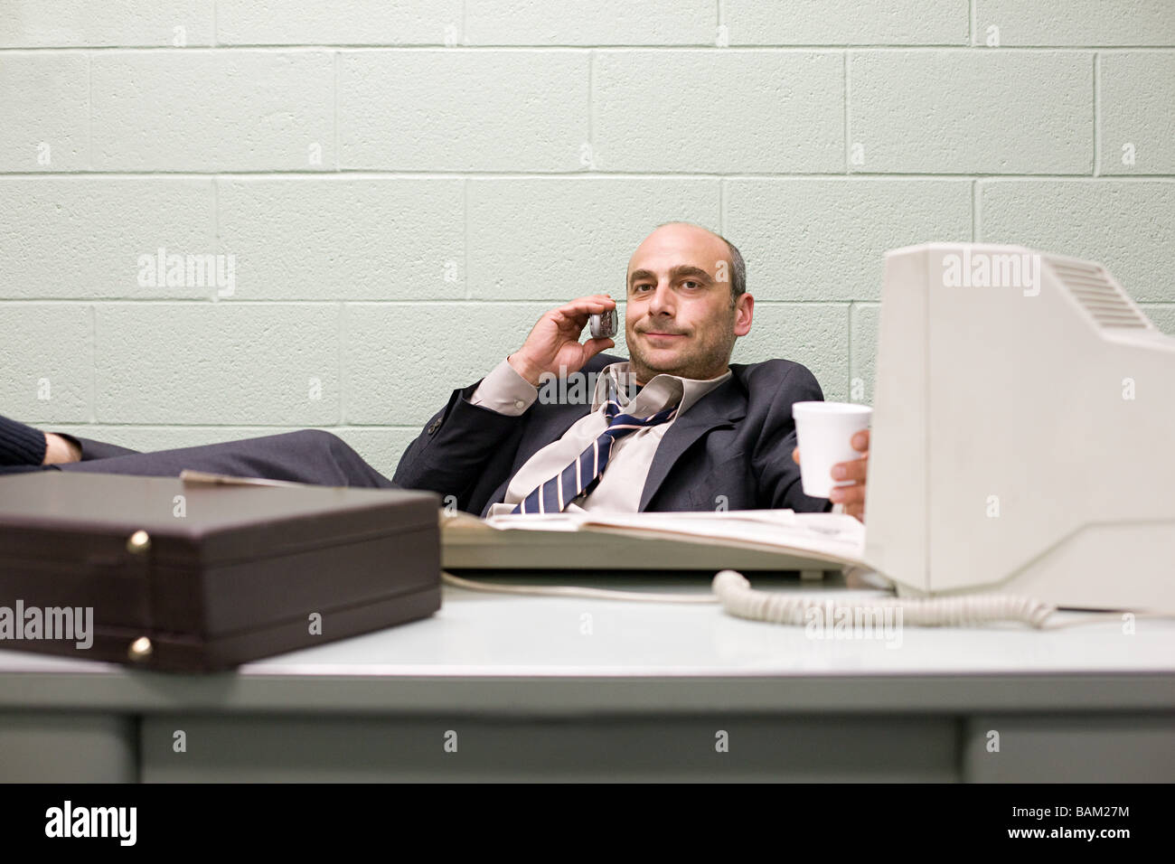 Detective at his desk Stock Photo - Alamy