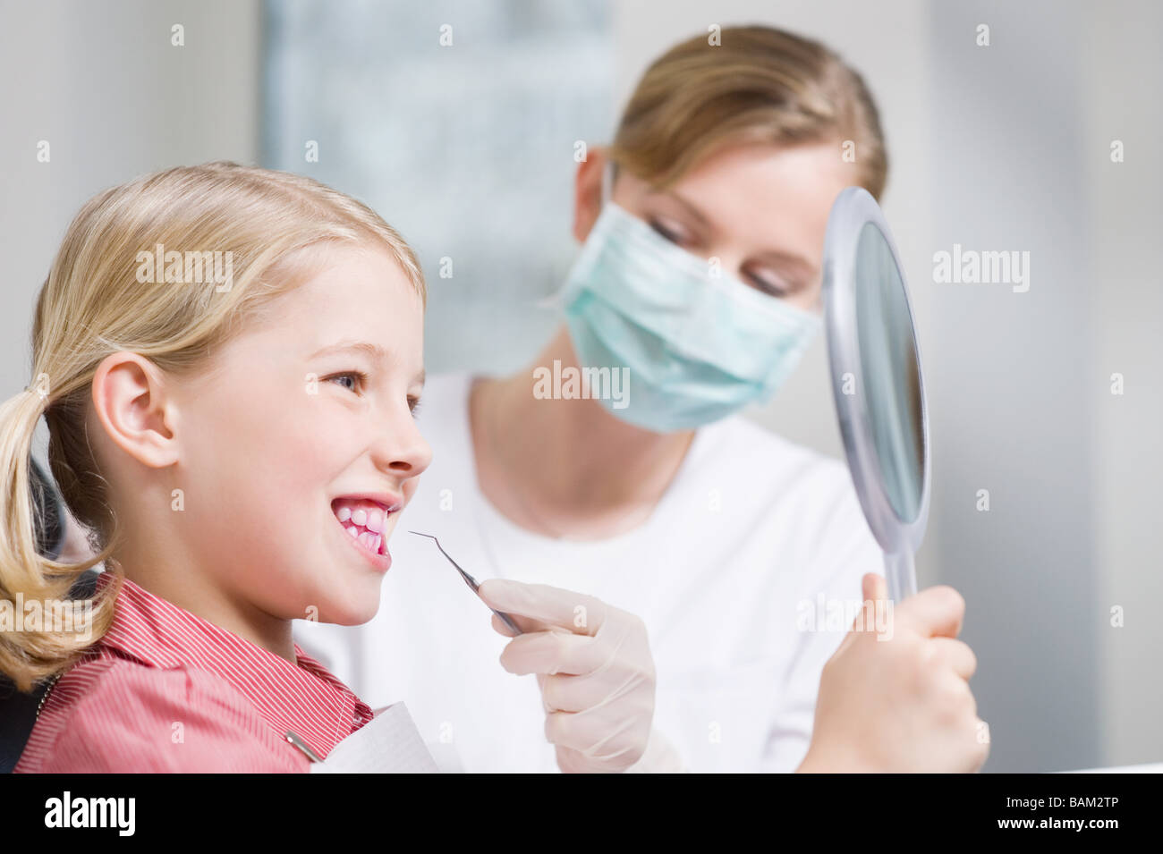 Girl and dental hygienist Stock Photo