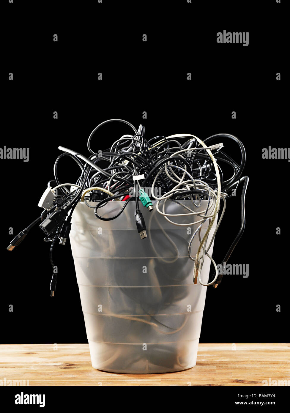 Computer cables in a waste bin Stock Photo Alamy