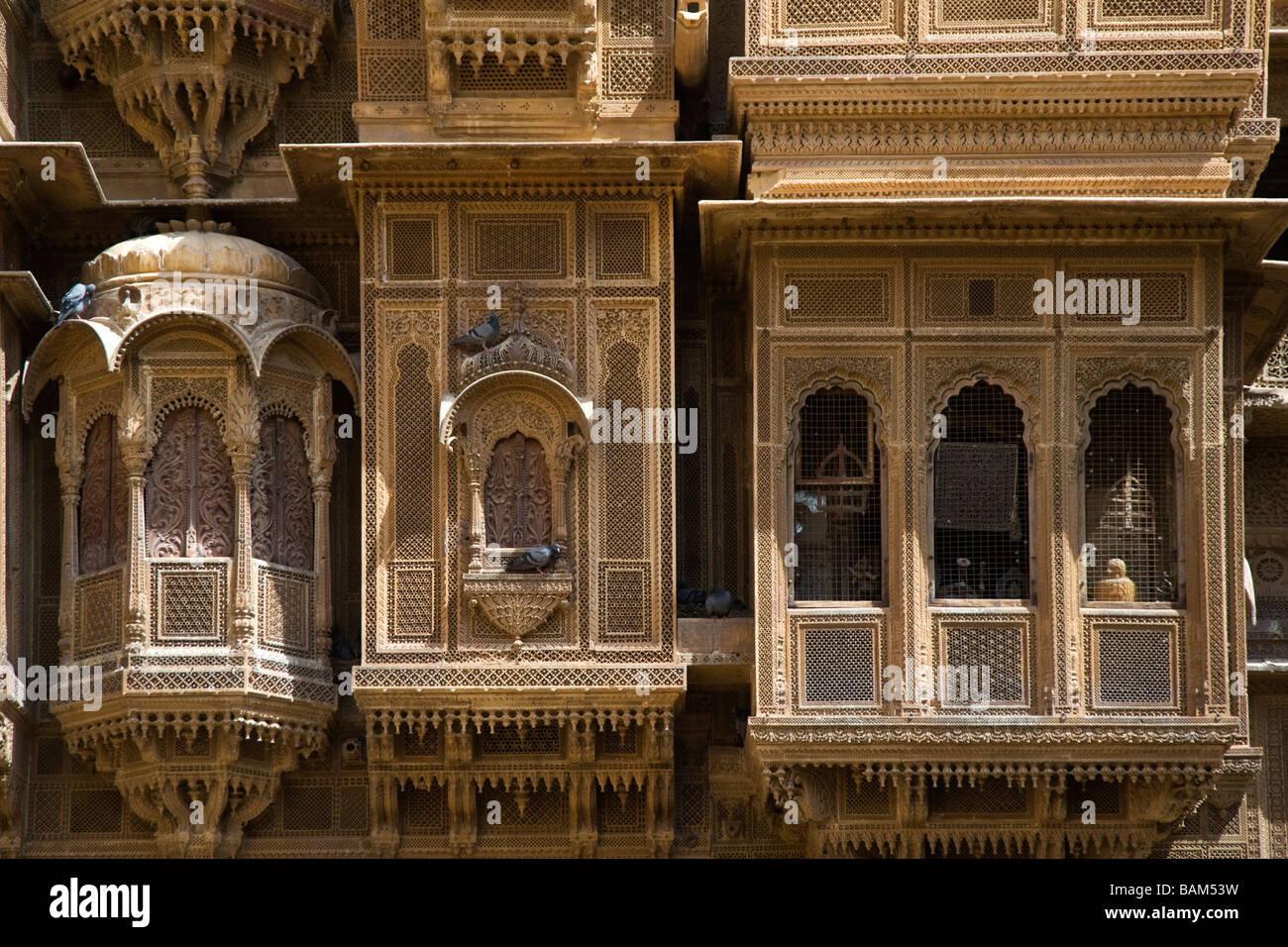 Clerestory windows and balcony of the Patwon Patwa ki Haveli Palace Jaisalmer Stock Photo
