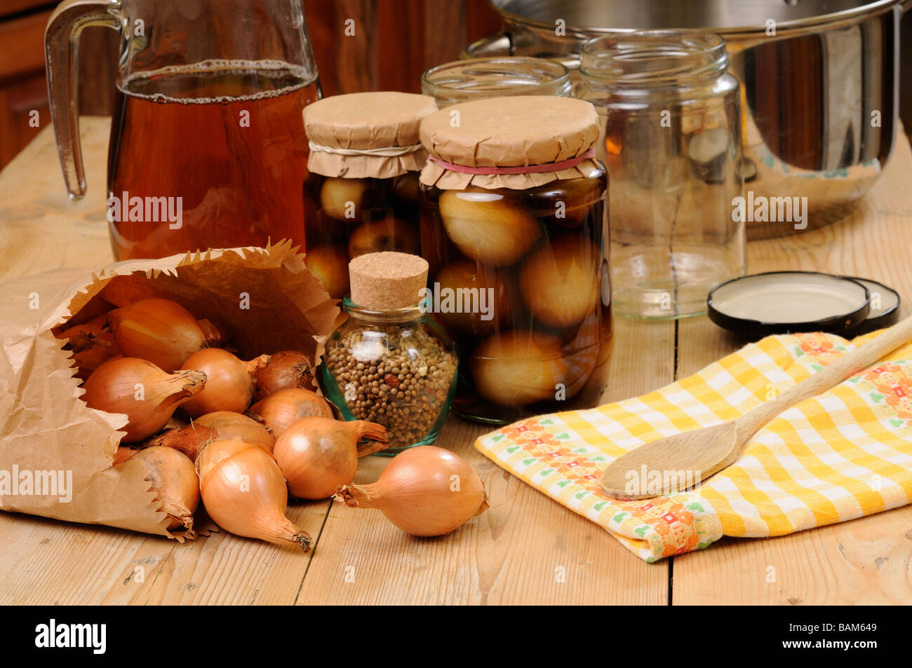 Country kitchen scene with home made jars of pickled onions Stock Photo