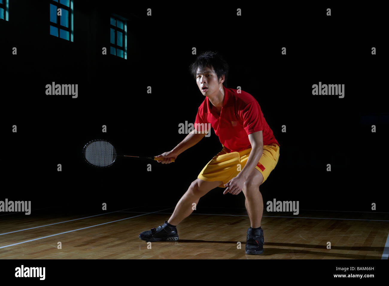 Young Man Playing A Game Of Badminton Stock Photo