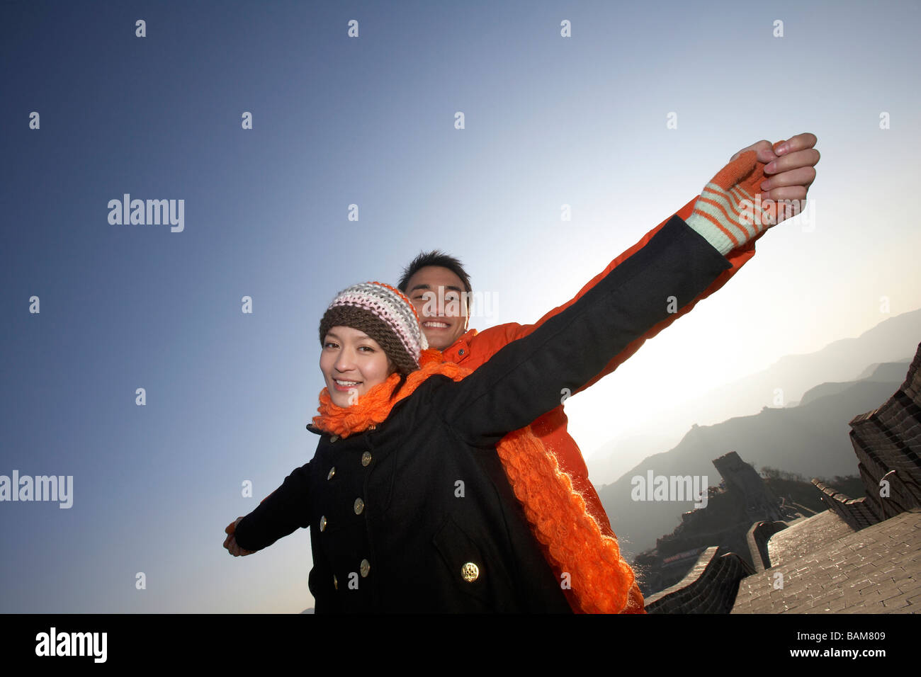 Happy asian couple standing hi-res stock photography and images - Alamy