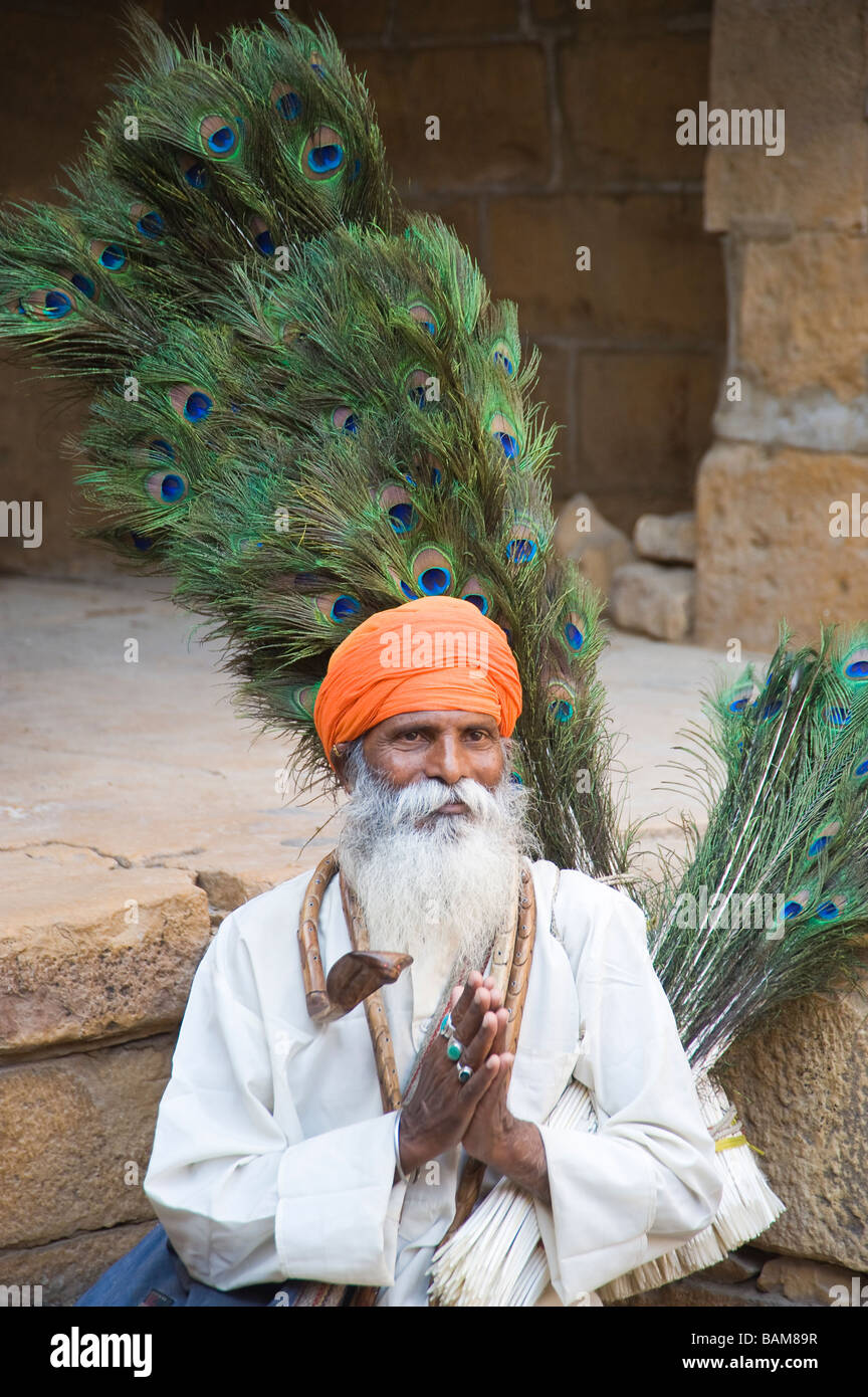 Indian man selling peacock feathers Jaisalmer Stock Photo Alamy