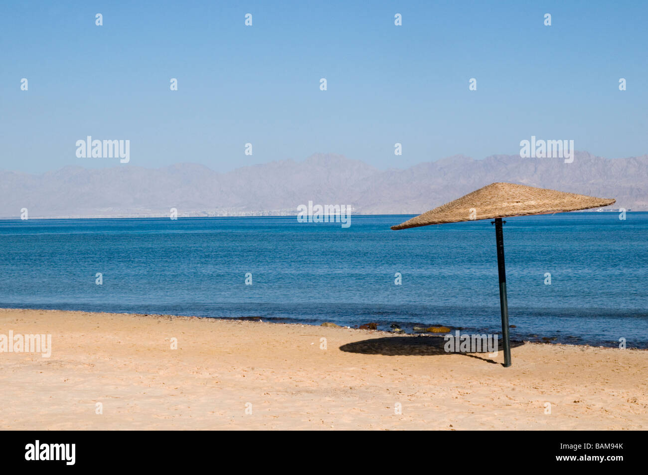 beach beaches hot sunny shade sun shade sunshade Stock Photo - Alamy