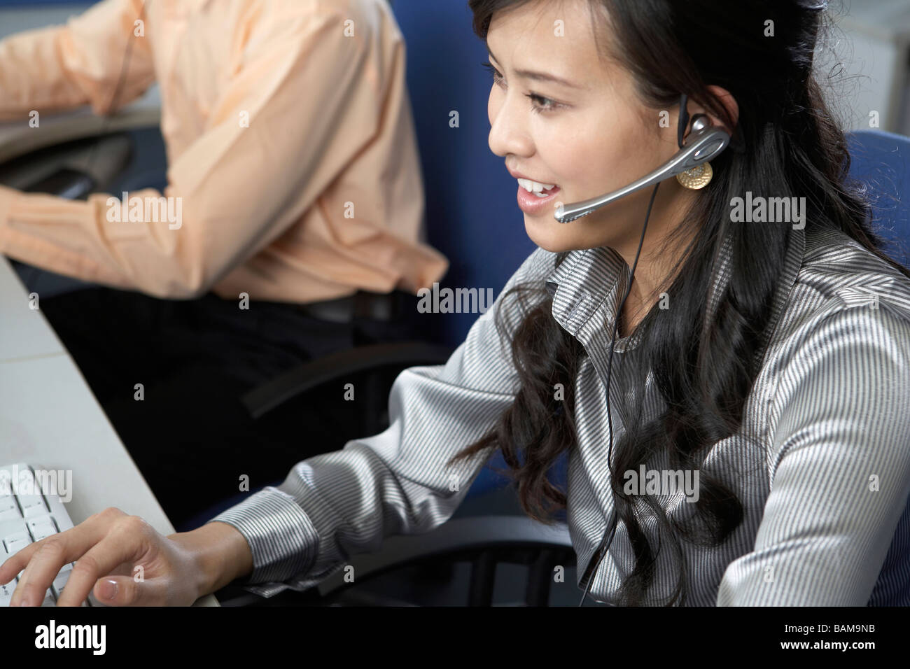 Businesswoman Using Computer Stock Photo - Alamy