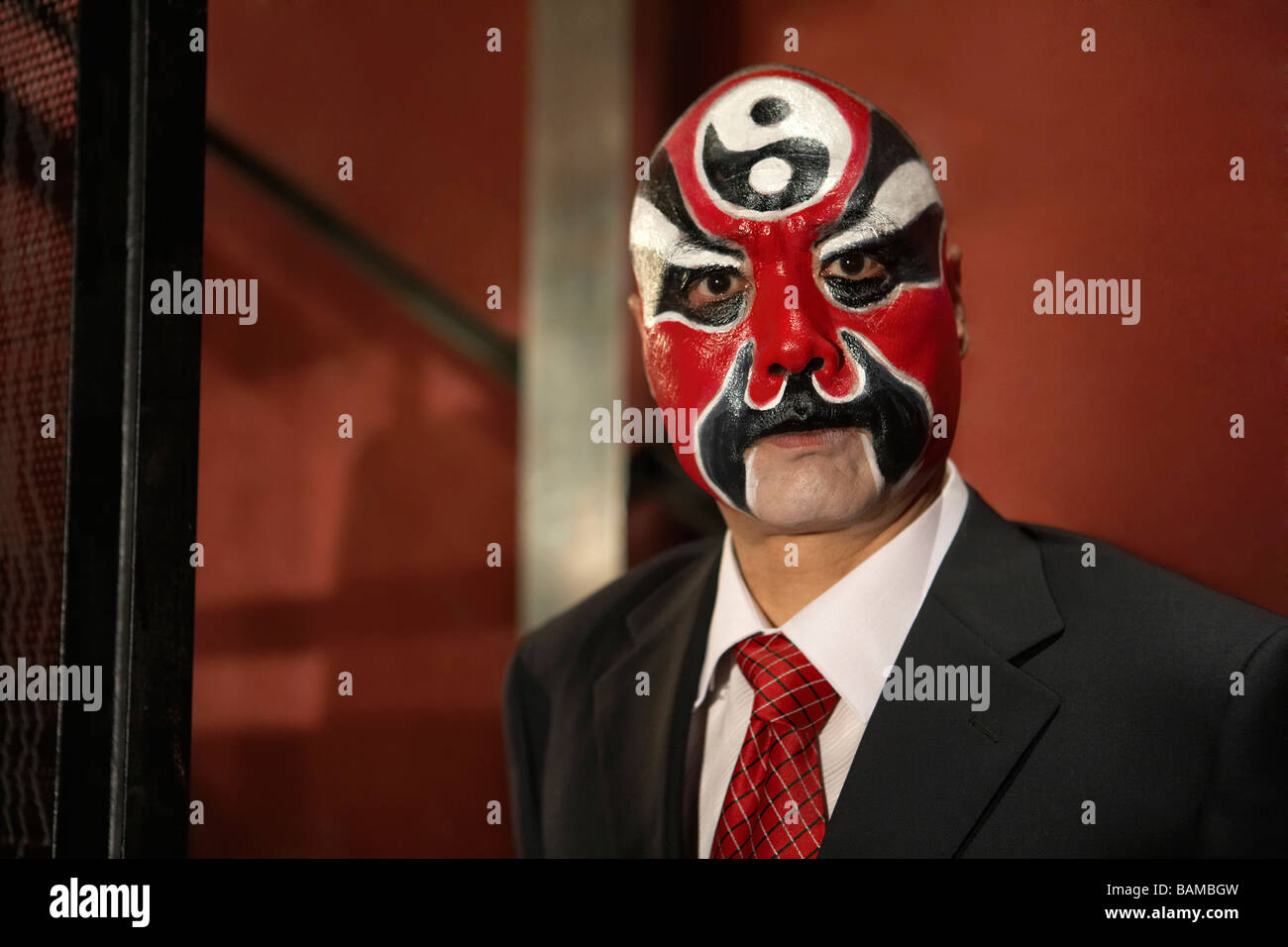 Man Wearing Business Suit, With Face Paint Stock Photo - Alamy
