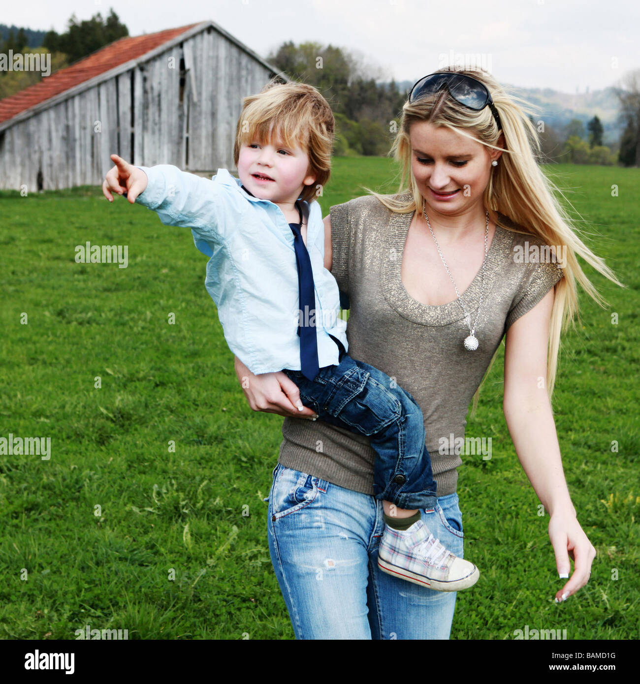 mother and son having fun outdoors Stock Photo