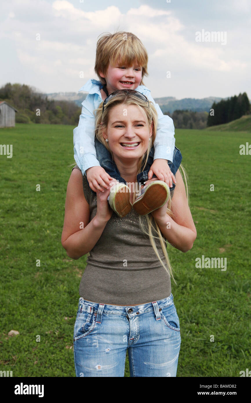 mother and son having fun outdoors Stock Photo