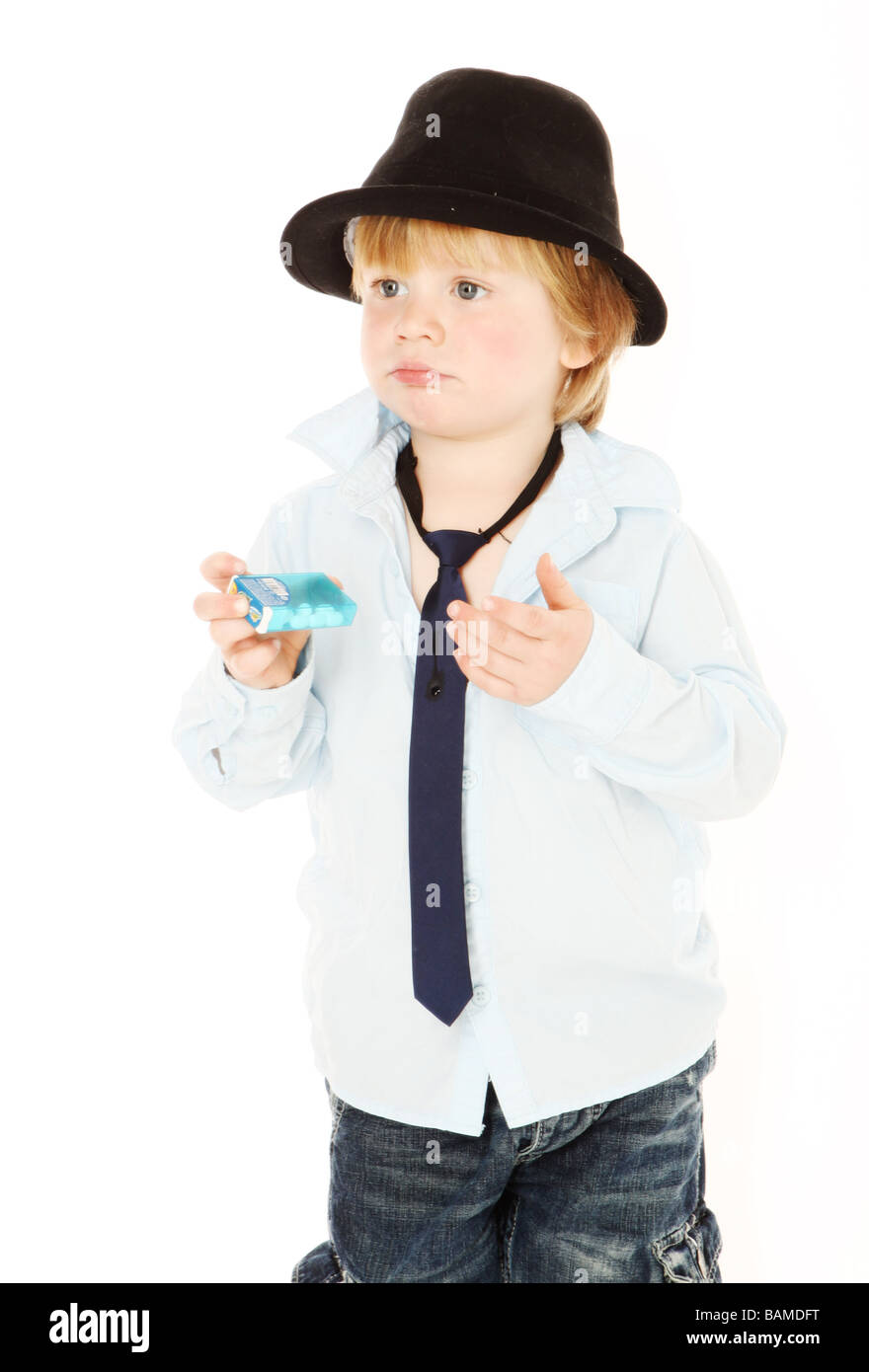 young boy with tie and hat isolated on white Stock Photo