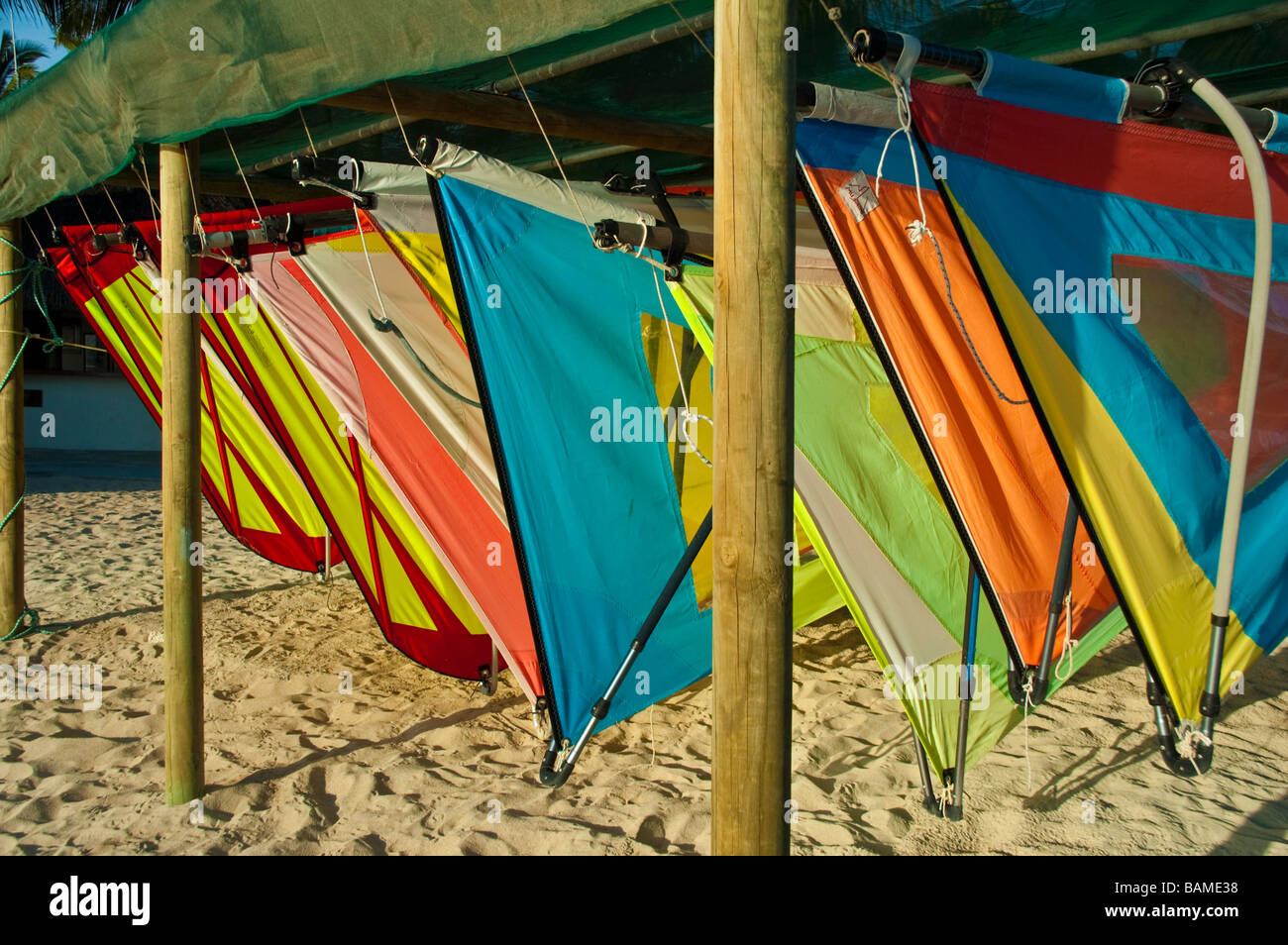 Windsurfing sails in many colours at beach of Sugar Beach Resort Resort Flic en Flac Mauritius Stock Photo