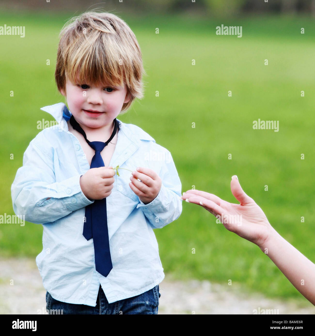 potrait of a two years old boy outdoors Stock Photo