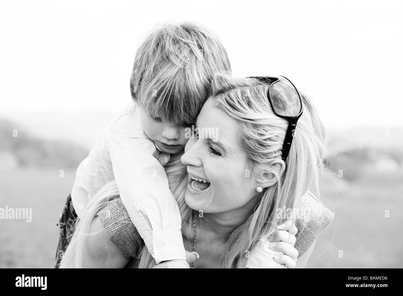 mother and son having fun outdoors Stock Photo