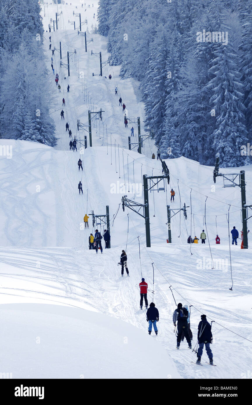 Ski lift in snowy mountains Stock Photo Alamy