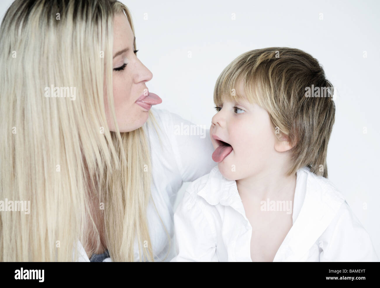 portrait of mother and son isolated on white Stock Photo
