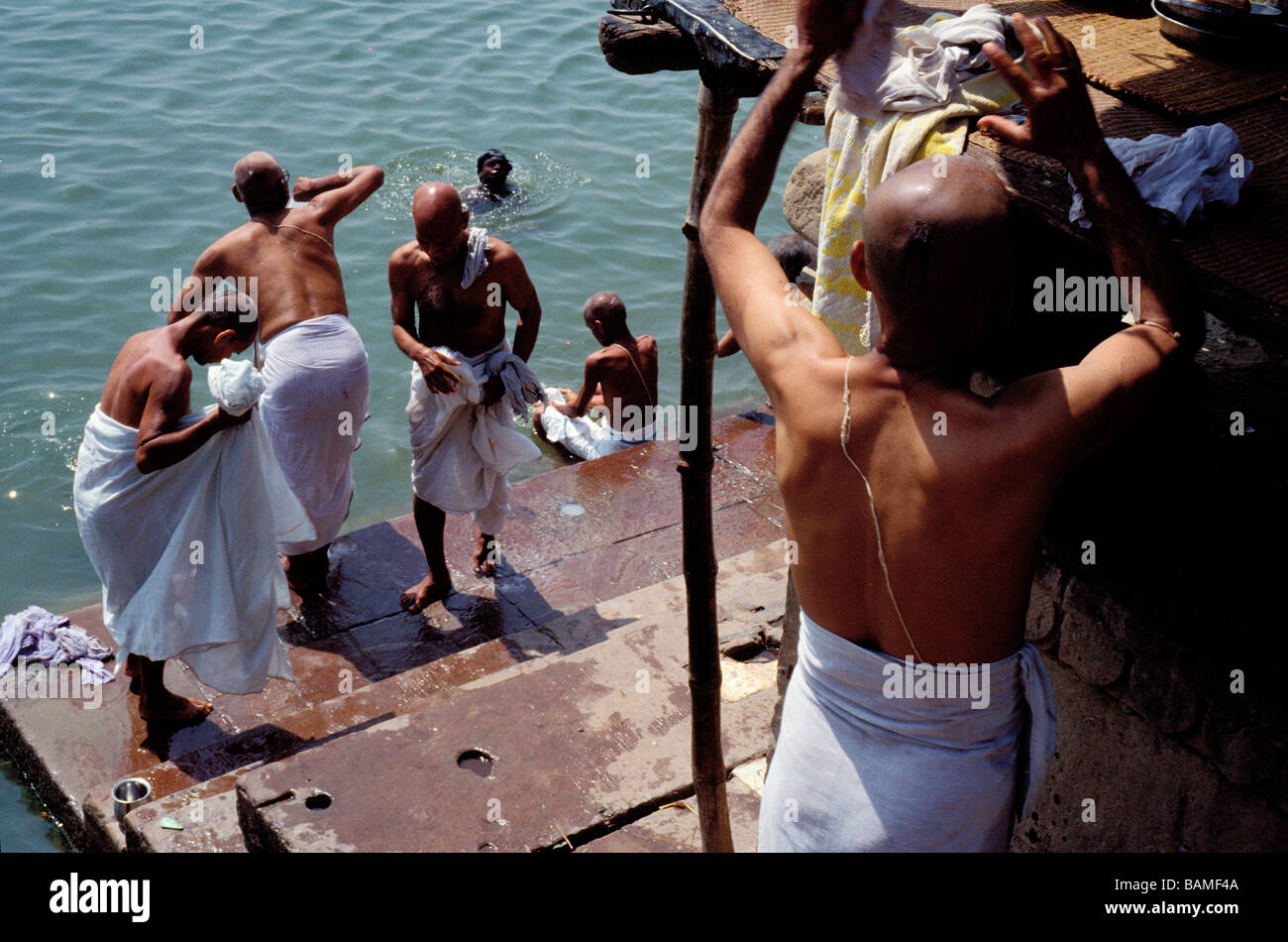 India, Uttar Pradesh State, the holly city of Benares (Varanasi), ritual bath in the Ganges, Brahman men Stock Photo