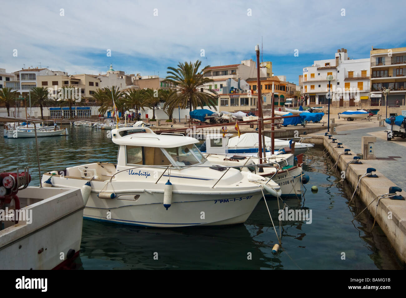 Yachts and classical Llaud fishing boats at Cala Ratjada Majorca Baleares Spain | Yachten und klassische Llaut Fischerboote Stock Photo