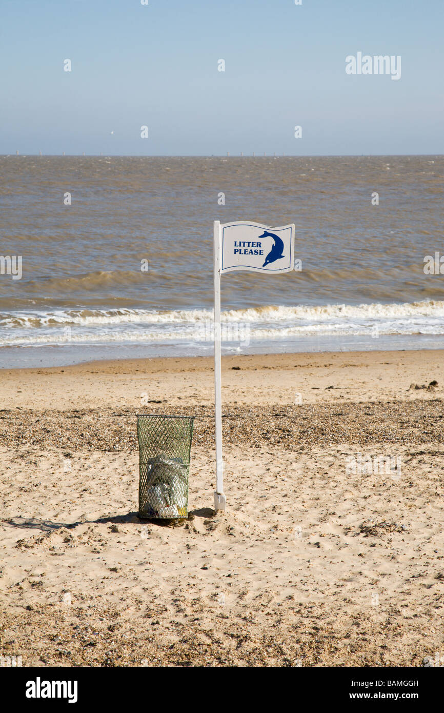 A waste paper bin on the beach at Clacton in Essex, England Stock Photo