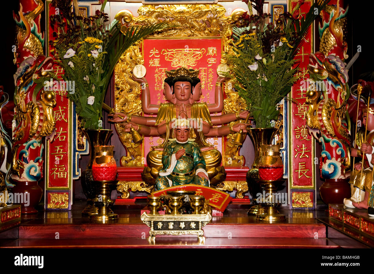 ALTAR WITH ORIENTAL GOD WITH THREE FACES SIX ARMS ORNAMENTED IN GOLD
