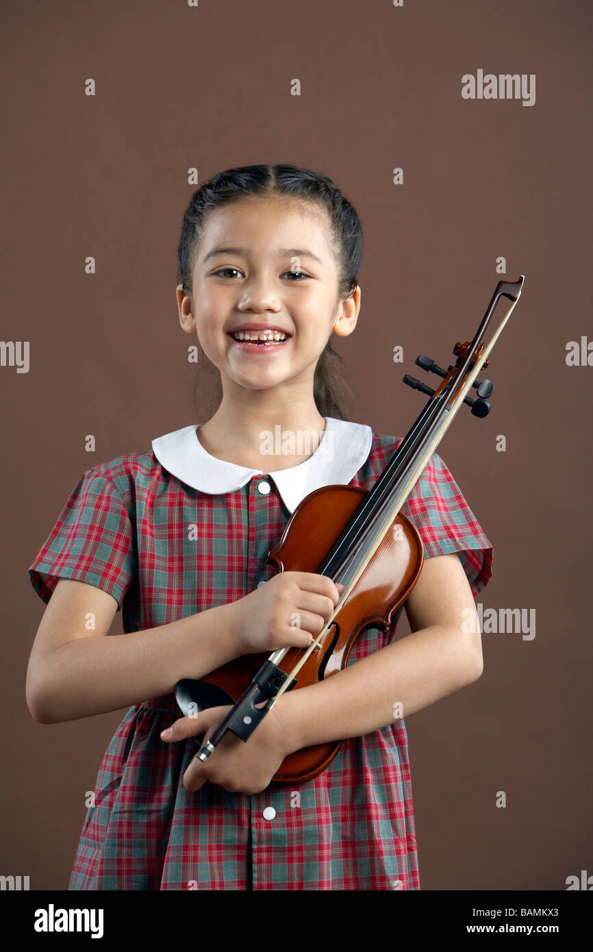 Girl violin school uniform hi-res stock photography and images - Alamy