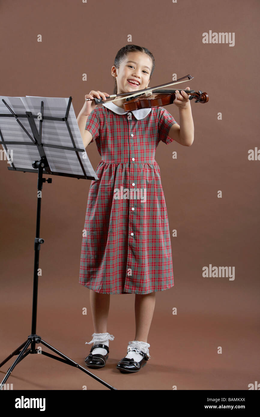 Girl Playing Violin Stock Photo - Alamy
