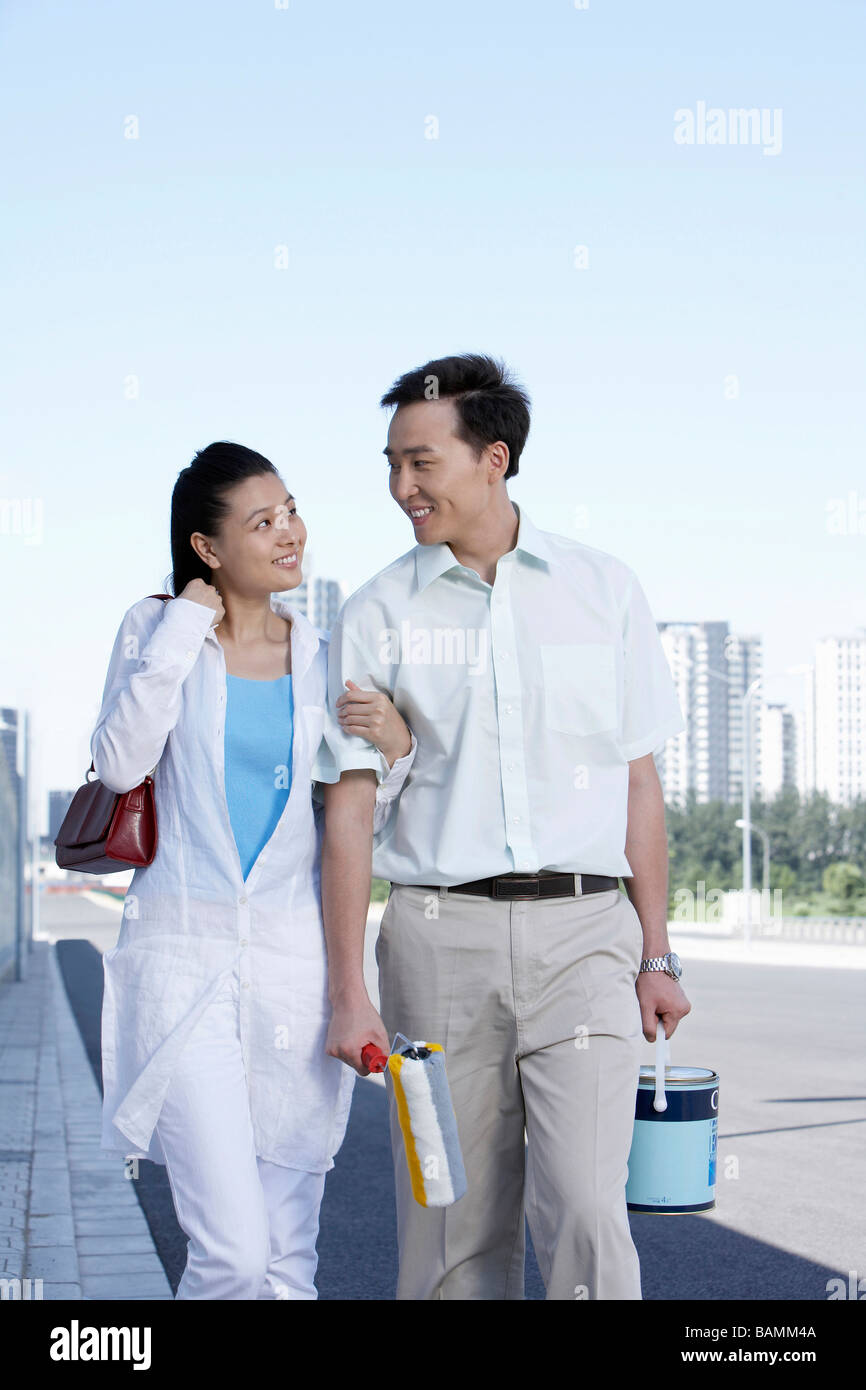 Linking arms and couple hires stock photography and images Alamy