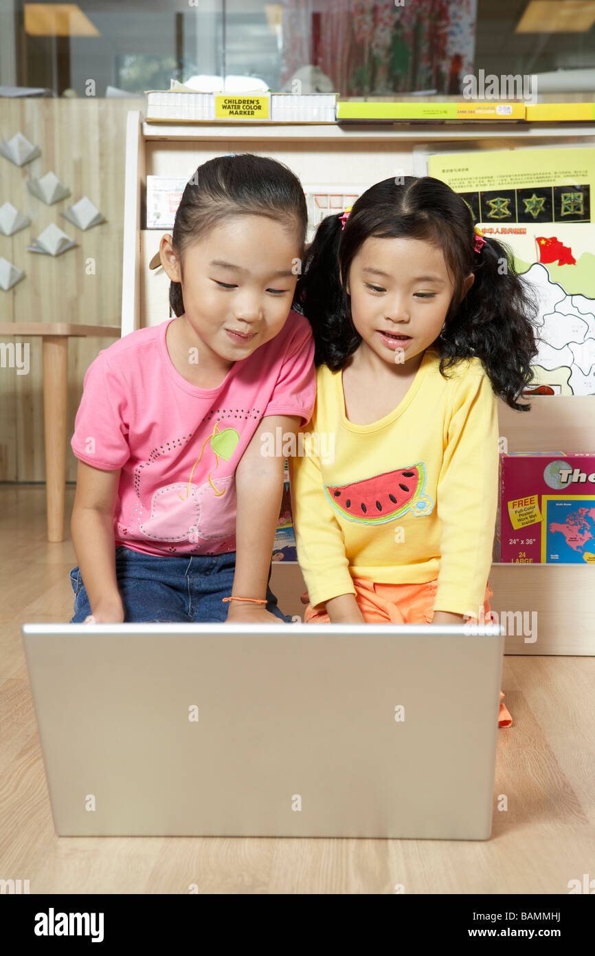 Young Children Using A Computer Stock Photo - Alamy